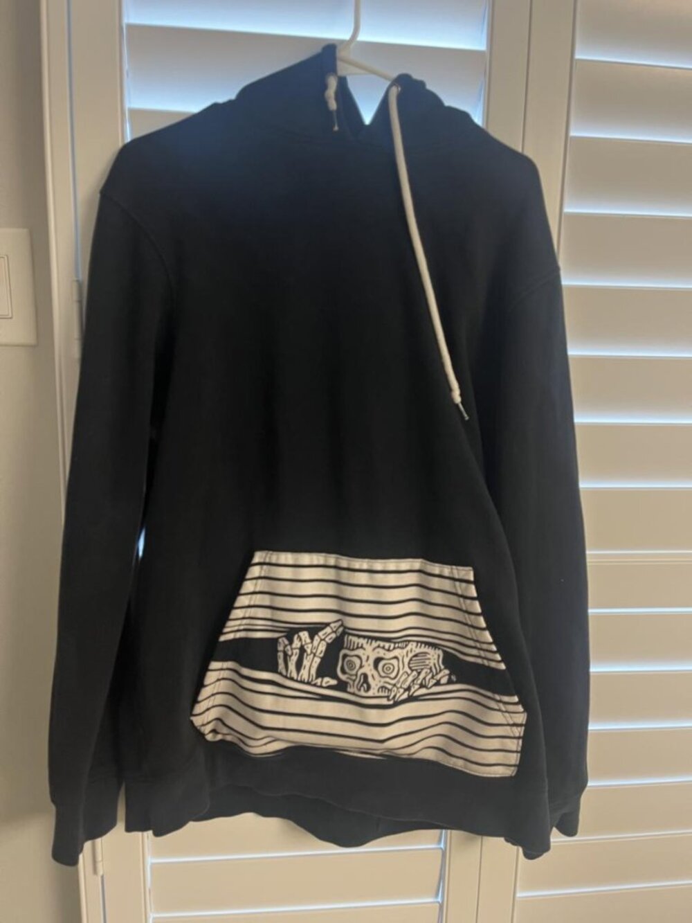 Lurking Class striped pocket peekaboo skull hoodie